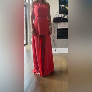 Prome dress. Beautiful long gown with shorter front. It’s like a peach color.